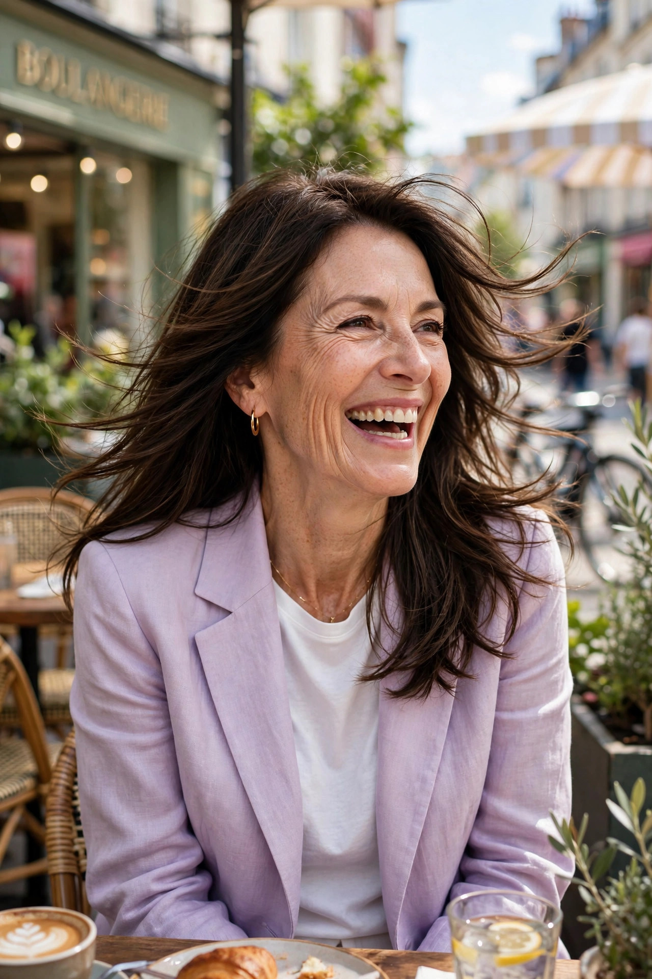 Flowing layered long hairstyles for women over 50 with soft movement and natural shine