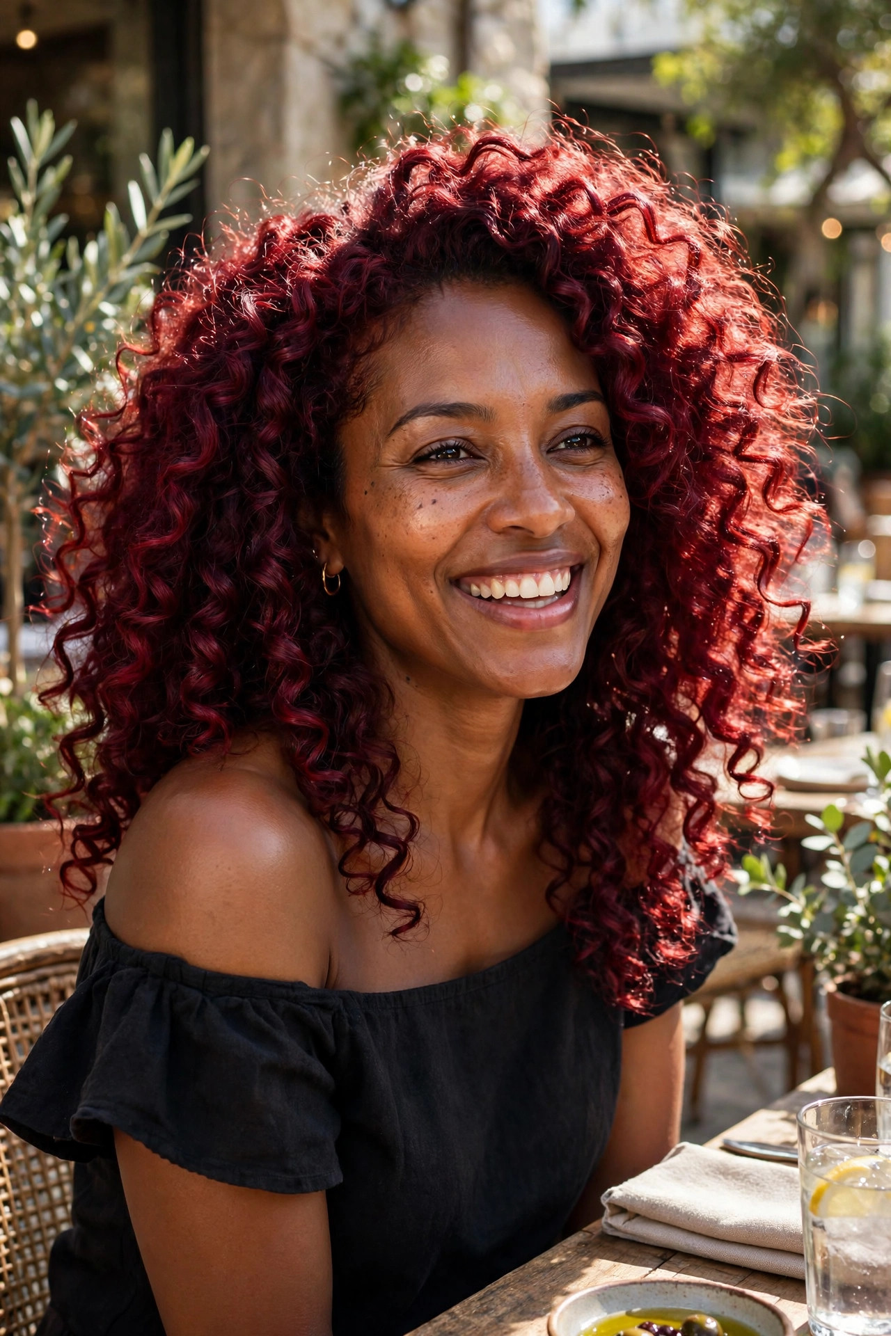 deep burgundy red curly witch hairstyles glowing